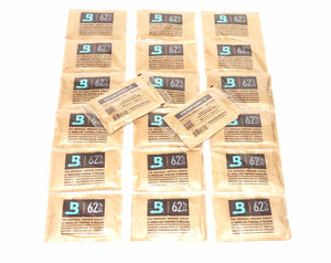 Multiple BOVEDA 62% RH Humidity Packs 67 Gram Size Individually Overwrapped laying on table 